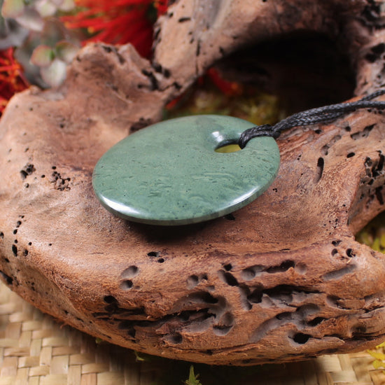 Porowhita or Pi Stone carved from NZ Pakohe or Argillite