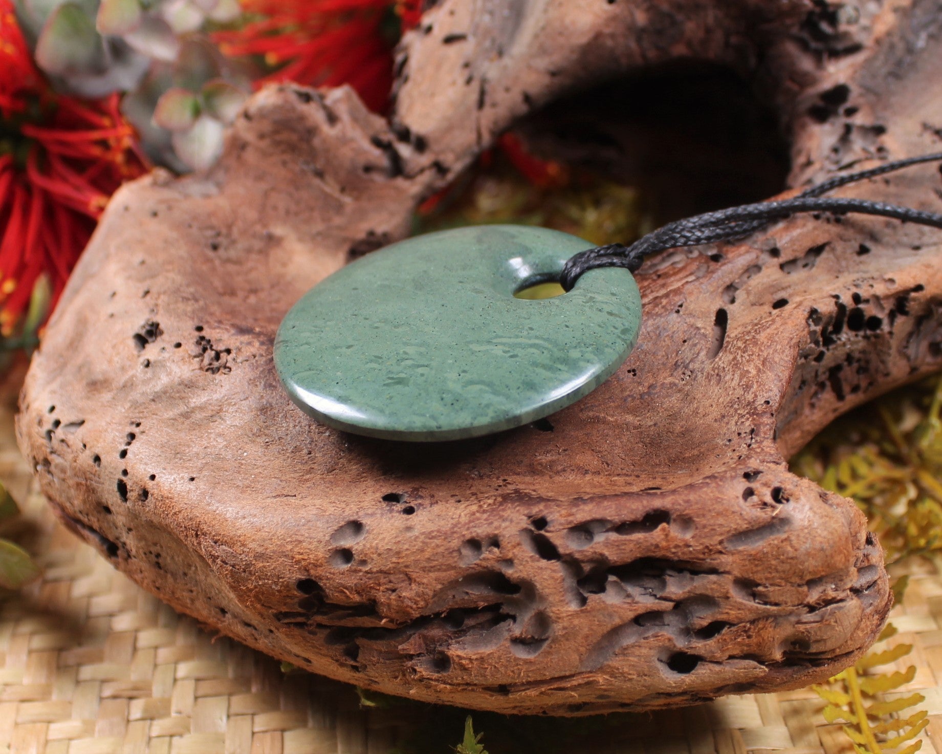 Porowhita or Pi Stone carved from NZ Pakohe or Argillite