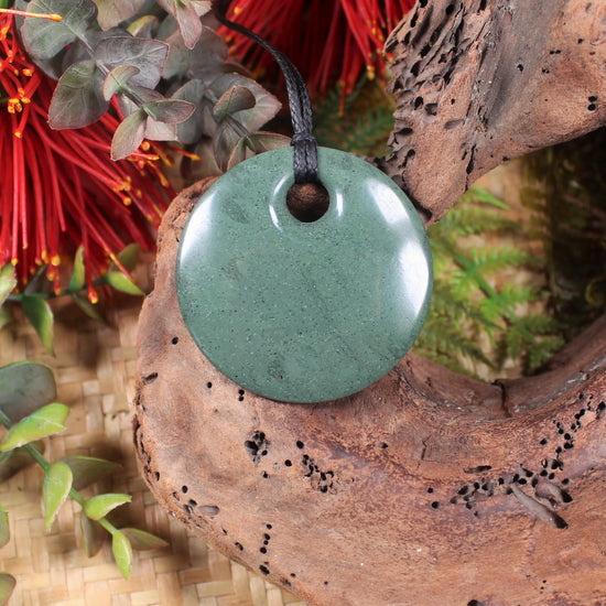 Porowhita or Pi Stone carved from NZ Pakohe or Argillite