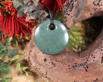 Porowhita or Pi Stone carved from NZ Pakohe or Argillite