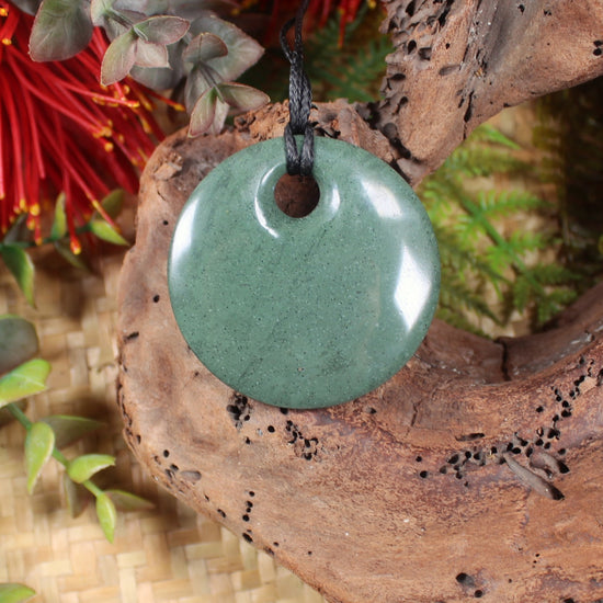 Porowhita or Pi Stone carved from NZ Pakohe or Argillite