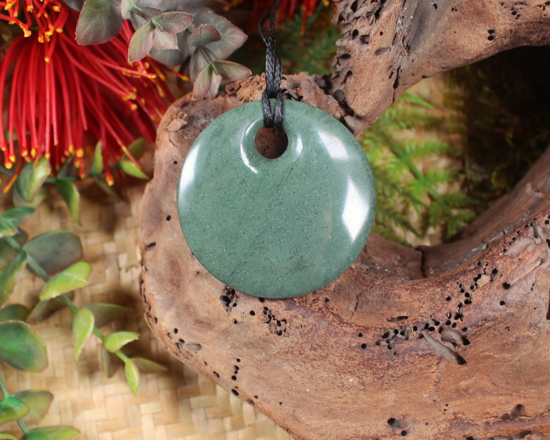 Porowhita or Pi Stone carved from NZ Pakohe or Argillite