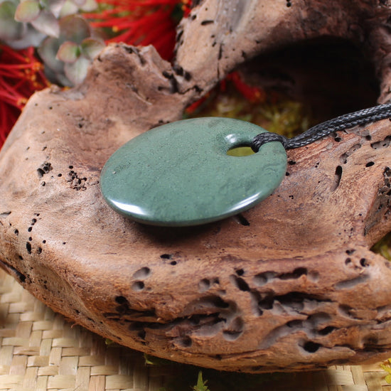 Porowhita or Pi Stone carved from NZ Pakohe or Argillite