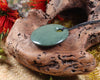 Porowhita or Pi Stone carved from NZ Pakohe or Argillite
