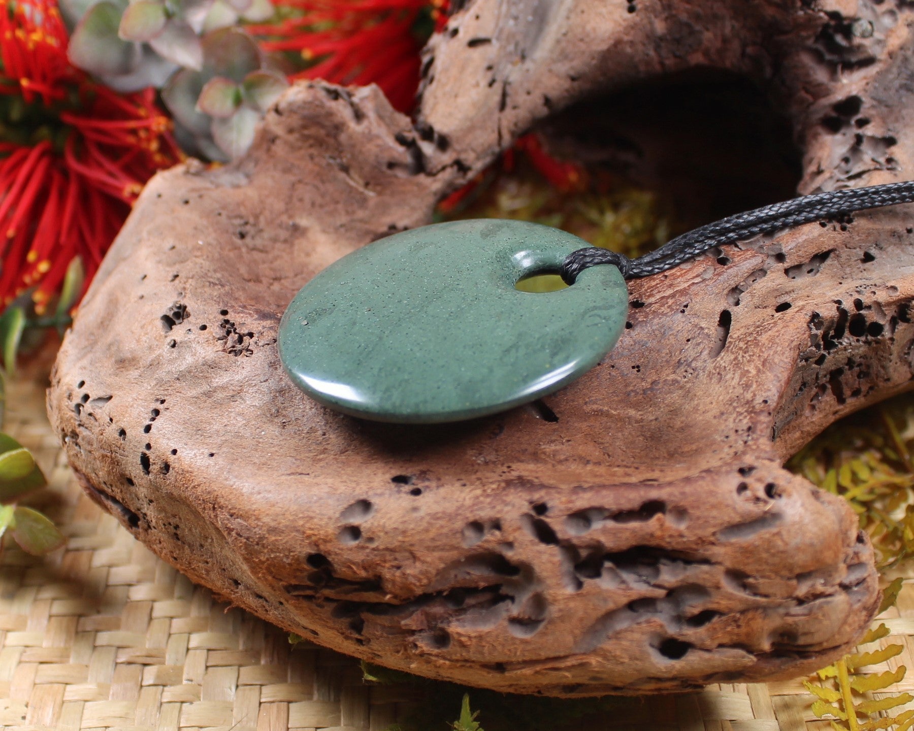 Porowhita or Pi Stone carved from NZ Pakohe or Argillite