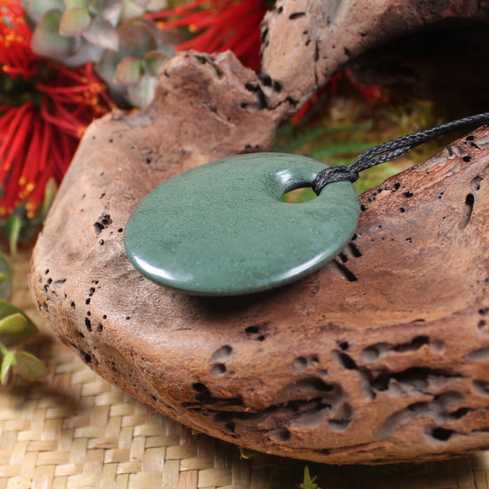 Porowhita or Pi Stone carved from NZ Pakohe or Argillite