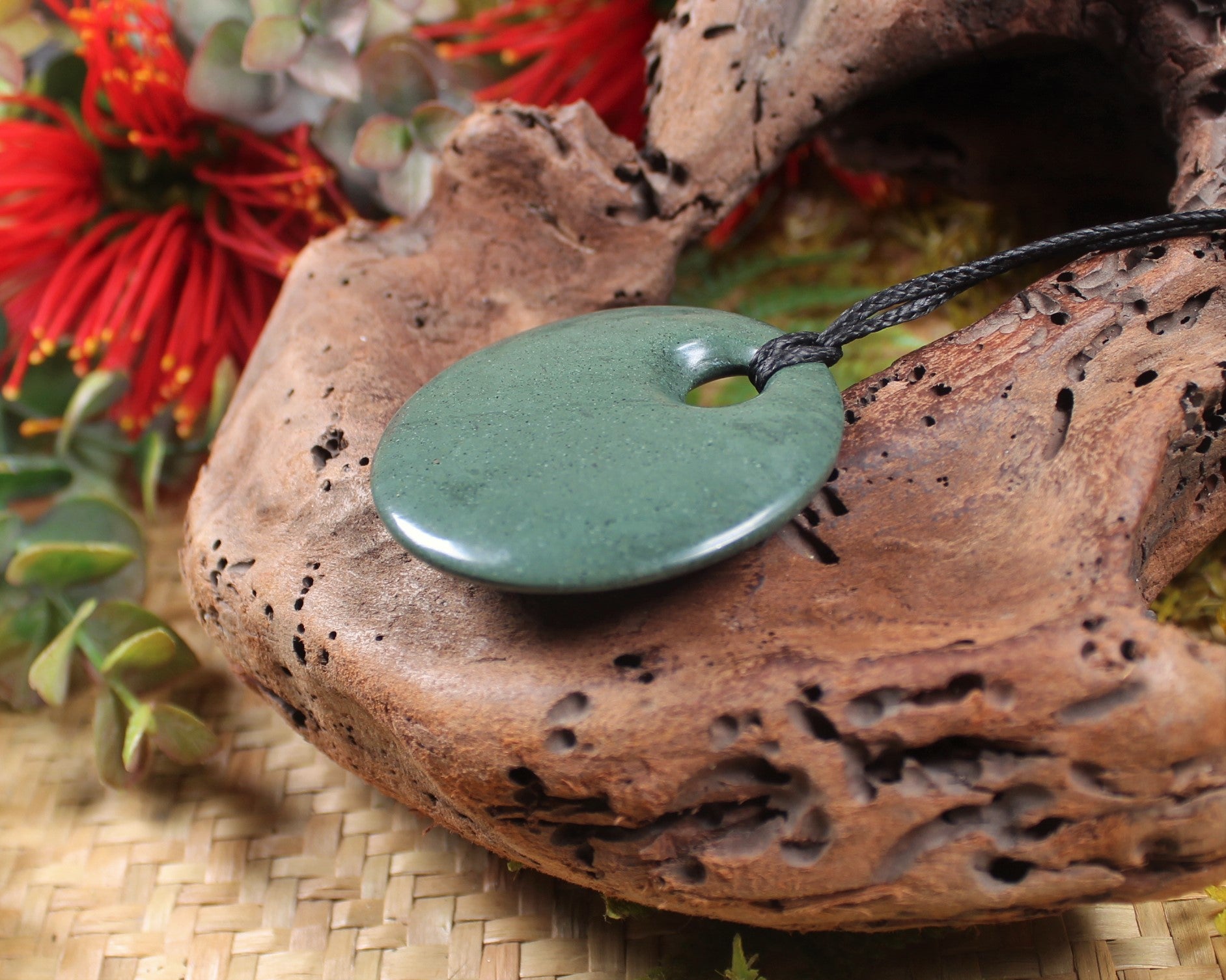 Porowhita or Pi Stone carved from NZ Pakohe or Argillite