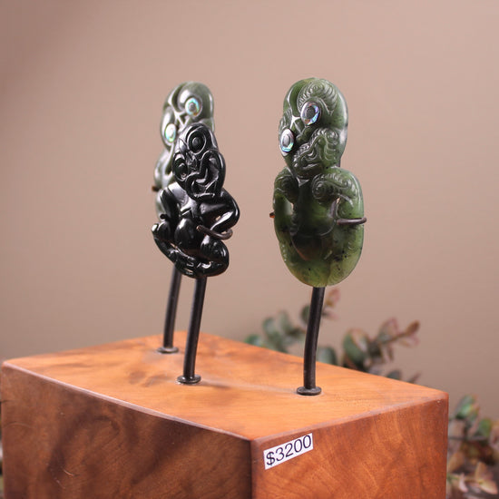 Hei Tiki Sculpture from Hapopo and Kawakawa Pounamu set into a Wooden base - NZ Greenstone