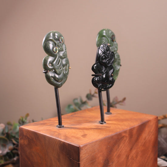 Hei Tiki Sculpture from Hapopo and Kawakawa Pounamu set into a Wooden base - NZ Greenstone