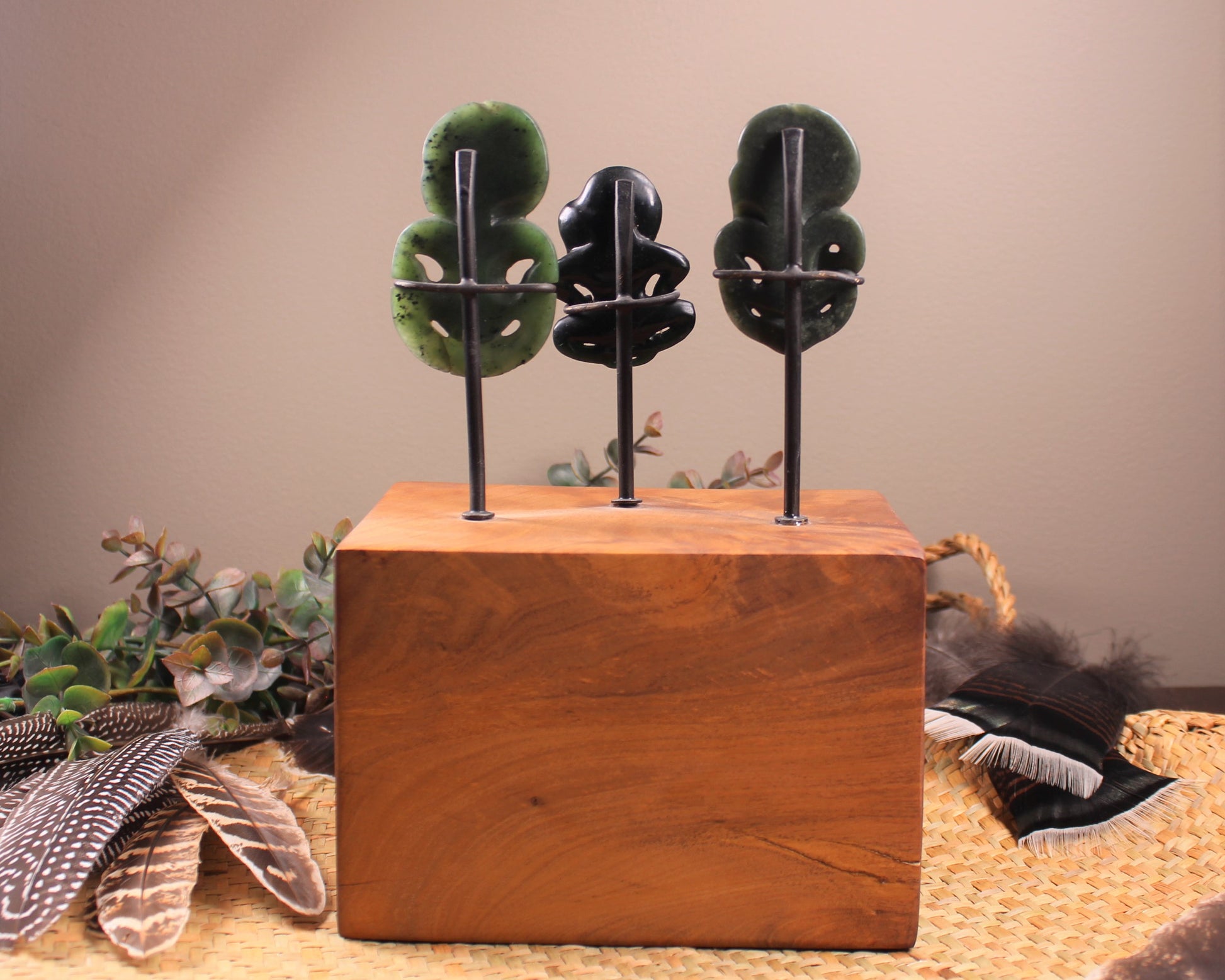 Hei Tiki Sculpture from Hapopo and Kawakawa Pounamu set into a Wooden base - NZ Greenstone