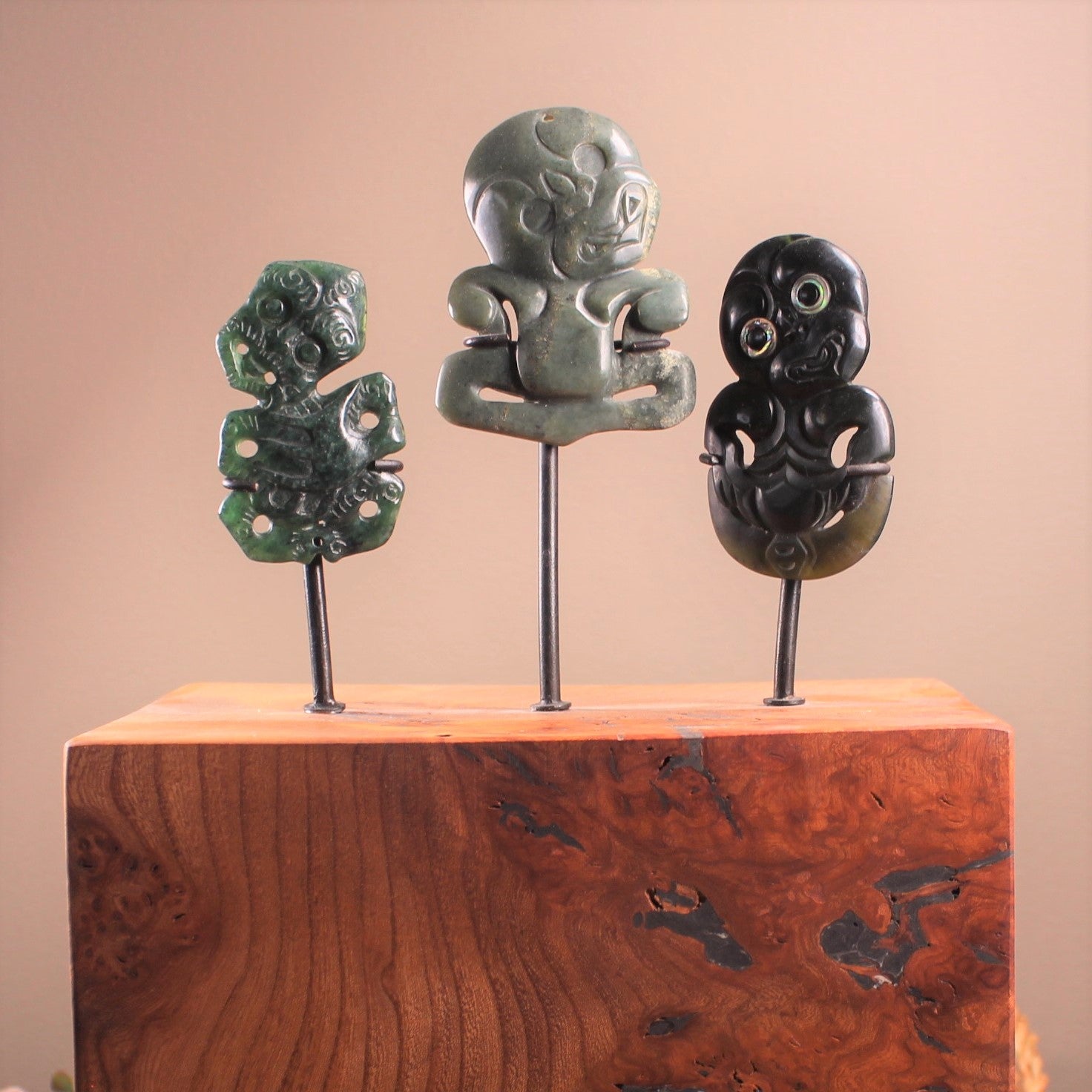Hei Tiki Sculpture from Hapopo and Kawakawa Pounamu set into a Wooden base - NZ Greenstone