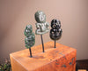 Hei Tiki Sculpture from Hapopo and Kawakawa Pounamu set into a Wooden base - NZ Greenstone
